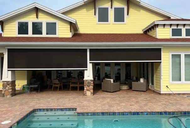 Dual-bronze-motorized-screens-Ormond-Beach